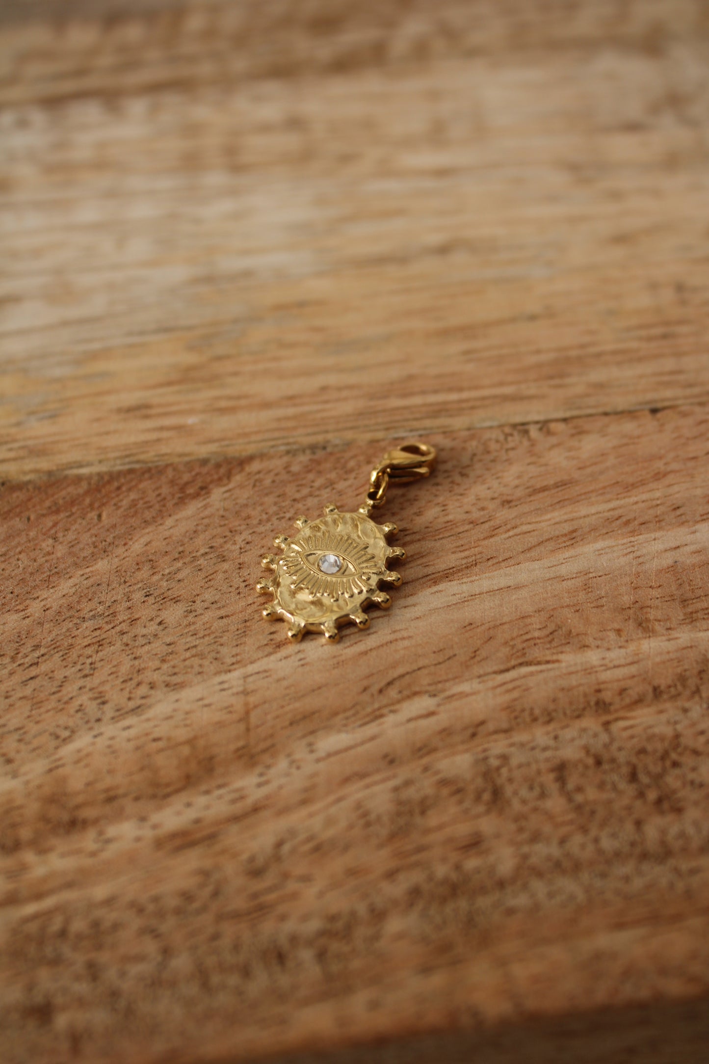 Charm martelé oeil